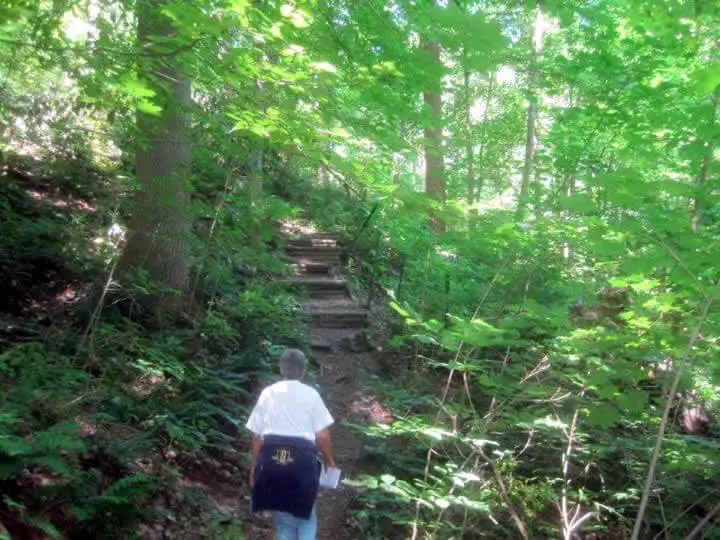A steep rocky climb above the Musconetcong River Gorge, rewarding hikers with elevated views of the river and valley below