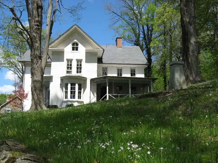 The historic Solitude House beside Lake Solitude, a landmark that adds cultural depth to an already beautiful natural setting